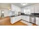 Cozy kitchen with stainless steel dishwasher, granite countertops, and white cabinets at 2833 Regency Rd, Lancaster, SC 29720