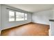 Spacious living room featuring hardwood floors, natural light, and ample space at 2833 Regency Rd, Lancaster, SC 29720