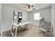 Bright home office with modern white desk, chair, and stylish decor at 2833 Regency Rd, Lancaster, SC 29720