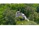 An aerial view of the home and surrounding lush, mature landscaping at 2923 Meadow Creek Ln, Monroe, NC 28110