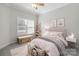 Decorated bedroom with playful decor and window at 2923 Meadow Creek Ln, Monroe, NC 28110