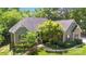 Inviting single-Gathering home with red shutters, lovely landscaping, and a welcoming front porch at 2923 Meadow Creek Ln, Monroe, NC 28110