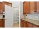 A large pantry with plenty of shelving offers abundant storage at 2923 Meadow Creek Ln, Monroe, NC 28110