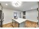 Kitchen island featuring quartz countertops, stainless steel appliances and open sight lines at 3120 Parkway Ave, Charlotte, NC 28208
