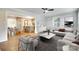 Spacious living room with hardwood floors, a ceiling fan, and an open concept design at 3120 Parkway Ave, Charlotte, NC 28208