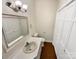 Clean bathroom with a tile floor, sink vanity, and a mirror with storage at 3203 Oakdale Dr, Monroe, NC 28110