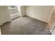 Bright bedroom featuring neutral walls and built-in storage at 3203 Oakdale Dr, Monroe, NC 28110