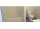 Bathroom featuring a shower-tub combo and toilet at 3315 Buffalo Shoals Rd, Newton, NC 28658