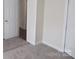 Carpeted bedroom showing 2 entry doors, neutral walls, and white trim at 3315 Buffalo Shoals Rd, Newton, NC 28658