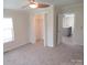Bedroom showing closet and doorway to a kitchen at 3315 Buffalo Shoals Rd, Newton, NC 28658