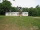 Inviting single-story house showcasing a well-manicured front lawn at 3315 Buffalo Shoals Rd, Newton, NC 28658
