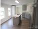 Bright kitchen boasting gray cabinetry, stainless steel appliances, and an island at 3315 Buffalo Shoals Rd, Newton, NC 28658