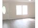 Bright living room with lots of natural light, modern flooring and a front door at 3315 Buffalo Shoals Rd, Newton, NC 28658
