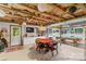 Finished basement featuring a poker table, pool table, bar, and ample space for recreation and entertaining at 341 N Mulberry St, Statesville, NC 28677