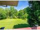 Lawn view from deck features a clear blue sky and line of trees at 3520 4Th Street Nw Blvd, Hickory, NC 28601
