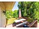 Wooden deck with outdoor seating and a view of a lawn surrounded by a tree line at 3520 4Th Street Nw Blvd, Hickory, NC 28601