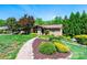 Charming single story home with brick facade and decorative landscaping at 3520 4Th Street Nw Blvd, Hickory, NC 28601