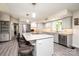 Modern kitchen featuring stainless steel appliances, granite countertops, and a large island at 3520 4Th Street Nw Blvd, Hickory, NC 28601
