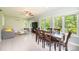 Bright living area with views, a ceiling fan, and a dining table at 3520 4Th Street Nw Blvd, Hickory, NC 28601