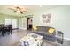Inviting living room with tile flooring, comfortable seating, and sliding doors at 3520 4Th Street Nw Blvd, Hickory, NC 28601