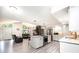 Open concept kitchen and living space with fireplace and stainless steel appliances at 3520 4Th Street Nw Blvd, Hickory, NC 28601