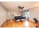 Relaxing bedroom with hardwood floors, a ceiling fan, and natural light at 3520 4Th Street Nw Blvd, Hickory, NC 28601