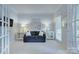 Cozy living room with neutral paint and French doors at 3632 Cole Mill Rd, Charlotte, NC 28270