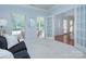 Comfortable living room with a large window at 3632 Cole Mill Rd, Charlotte, NC 28270