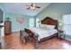 Spacious main bedroom with high ceiling, wood floors, and large windows at 3632 Cole Mill Rd, Charlotte, NC 28270