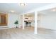 Finished basement with luxury vinyl plank flooring, white support pillars, and recessed lighting at 383 Camden Nw Ct, Concord, NC 28027