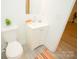Bright bathroom with white vanity, toilet, and modern faucet at 383 Camden Nw Ct, Concord, NC 28027