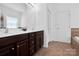 Bathroom featuring a double vanity, tile floor, and a walk in shower at 4028 Garden Oak Dr, Indian Trail, NC 28079