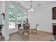 Cozy breakfast area with large windows overlooking the backyard at 4028 Garden Oak Dr, Indian Trail, NC 28079