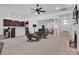 Open concept living space with views into the kitchen and sunroom at 4028 Garden Oak Dr, Indian Trail, NC 28079