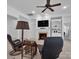 Cozy living room with fireplace, built-ins, and comfortable seating at 4028 Garden Oak Dr, Indian Trail, NC 28079