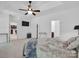 Open and airy main bedroom with tray ceiling and ensuite bathroom at 4028 Garden Oak Dr, Indian Trail, NC 28079
