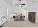 Spacious main bedroom features tray ceiling, ceiling fan and ensuite bathroom at 4028 Garden Oak Dr, Indian Trail, NC 28079