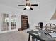 Well-lit home office featuring a ceiling fan, and French doors leading to another room at 4028 Garden Oak Dr, Indian Trail, NC 28079