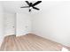 Neutral bedroom with ceiling fan, light floors, and natural light at 413 Jose St, Shelby, NC 28150
