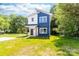 Charming, modern two-story home with blue and white exterior and inviting curb appeal at 413 Jose St, Shelby, NC 28150