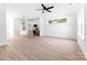 Bright, open living space featuring wood-look floors at 413 Jose St, Shelby, NC 28150
