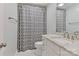 Cozy bathroom with a shower curtain, granite countertop vanity, and neutral color scheme at 417 Florence Cir, Statesville, NC 28625