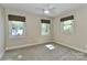 Bright bedroom with three windows and custom blinds creates a naturally well-lit and airy space at 417 Florence Cir, Statesville, NC 28625