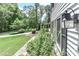 Charming home exterior featuring well-maintained landscaping, sidewalk, and classic shuttered windows at 417 Florence Cir, Statesville, NC 28625