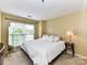 Calm bedroom featuring a large window and neutral decor at 517 N Graham St # 3E, Charlotte, NC 28202