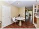 Cozy dining area featuring a modern table, chairs, and a view of the kitchen at 517 N Graham St # 3E, Charlotte, NC 28202