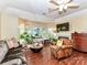 Bright living room with a fireplace and large windows that offer natural light at 517 N Graham St # 3E, Charlotte, NC 28202