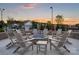 Outdoor fire pit with ample seating, perfect for evening gatherings and socializing with neighbors at 527 Sunharvest Ln, Indian Trail, NC 28079