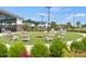 Enjoy outdoor fun with lawn games like cornhole, surrounded by comfortable seating and beautifully landscaped grounds at 527 Sunharvest Ln, Indian Trail, NC 28079