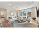 Bright living room featuring dual sofas, accent rug and lots of natural light at 527 Sunharvest Ln, Indian Trail, NC 28079
